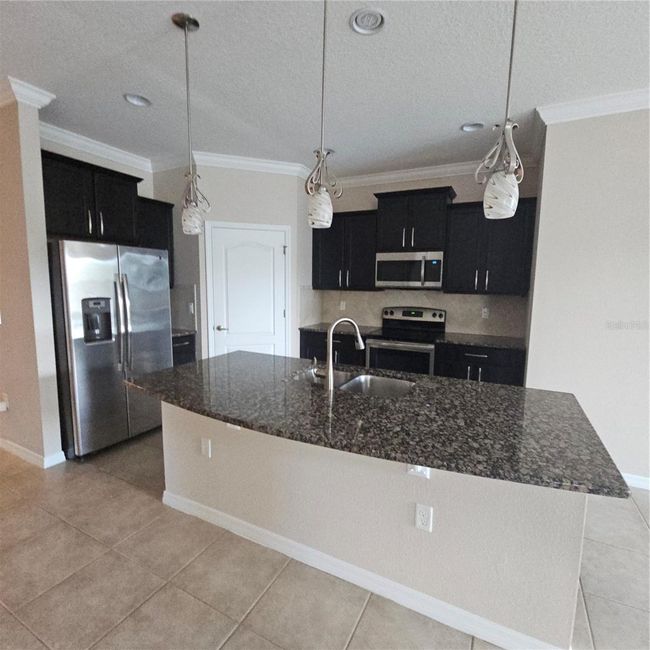 1942 Commander Way, House other with 3 bedrooms, 3 bathrooms and null parking in KISSIMMEE FL | Image 6