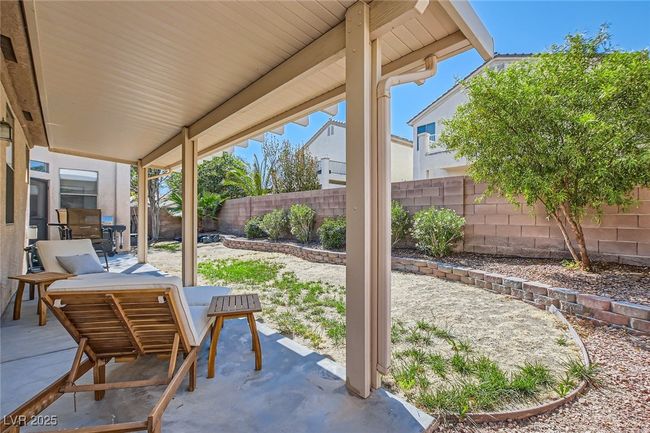 Fenced backyard featuring a patio area | Image 38