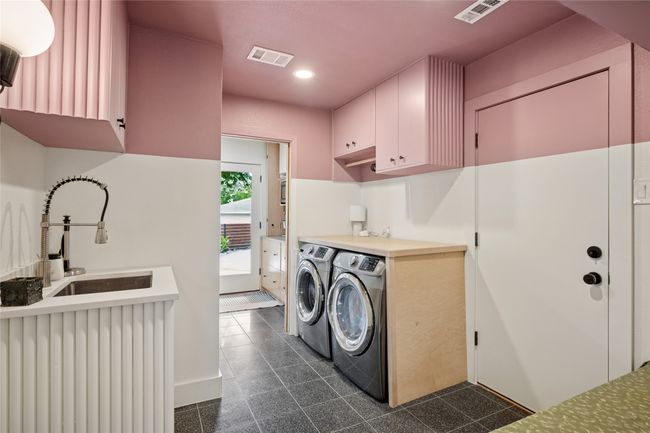 Oversized utility room with sink, bench seating and worktop. | Image 20