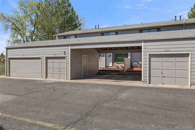Detached 1-car garage and carport located directly outside of home | Image 34