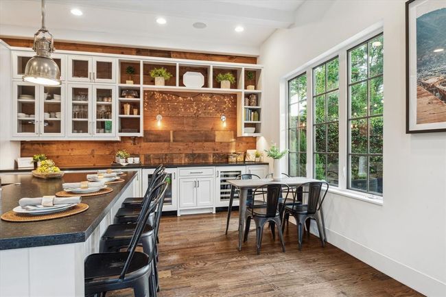 BREAKFAST AREA. Situated next to the kitchen garden window, this is a perfect spot for breakfast, catching up on emails and more casual meals. | Image 11