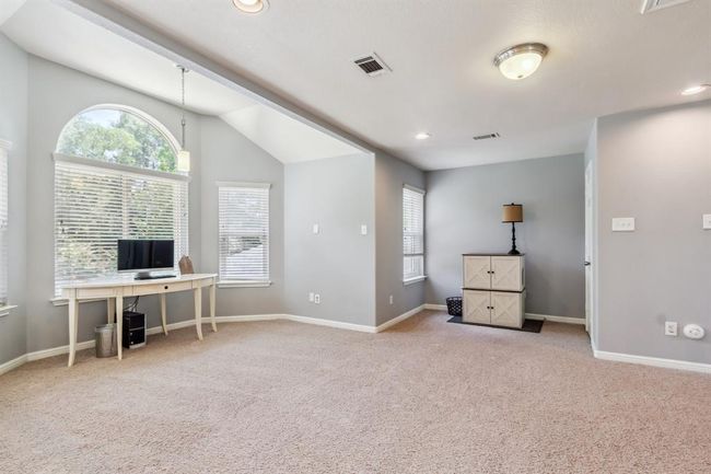 Game room has nooks for reading and working | Image 28