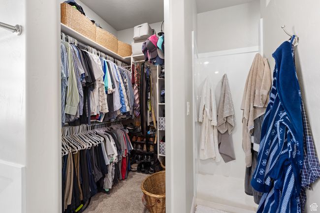 Spacious closet featuring carpet flooring | Image 31