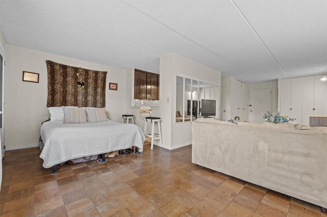 Bedroom featuring baseboards | Image 7
