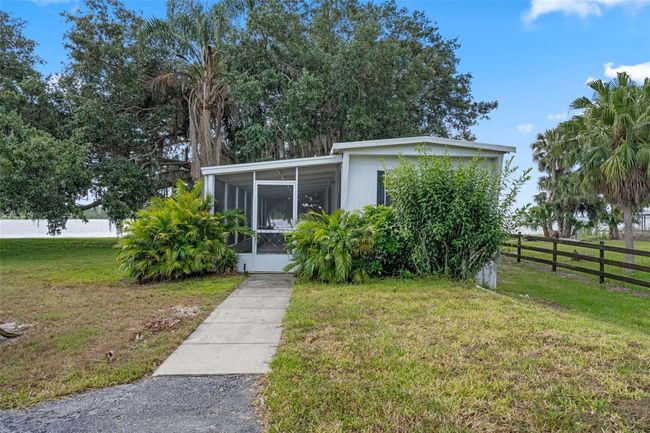 Mobile Home features 2 Bedroom/ 1 Bath and screened-in Front Porch comes turn key ready | Image 33