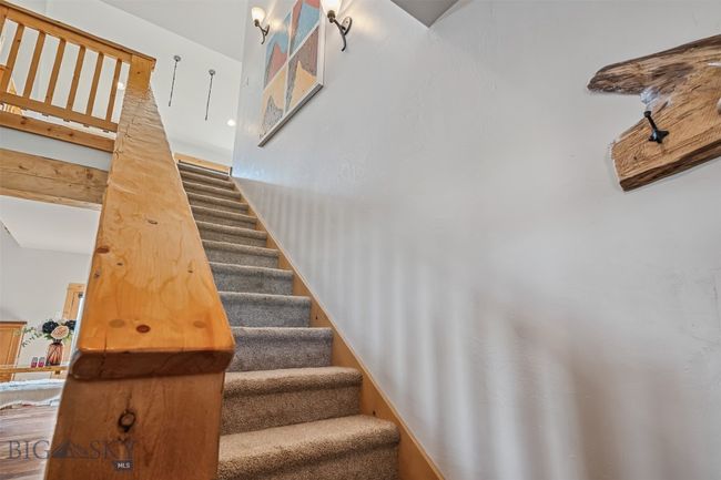 stairs to loft and additional bedrooms | Image 34