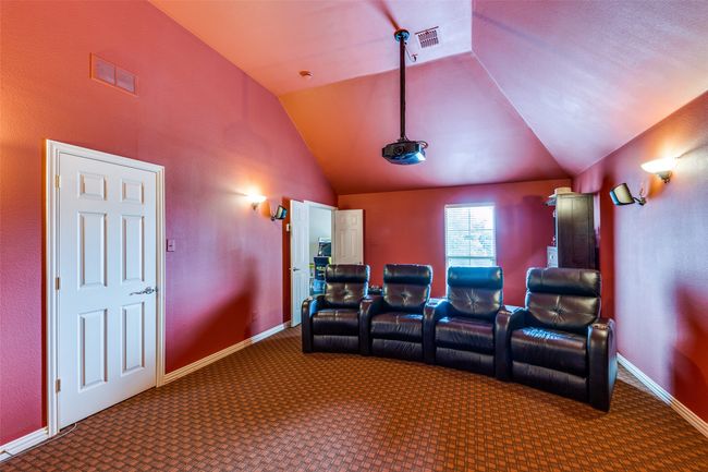This room is huge with a closet, screen & media equipment are negotiable | Image 28