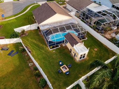 View of fully fenced back yard, new roof and pool | Image 2