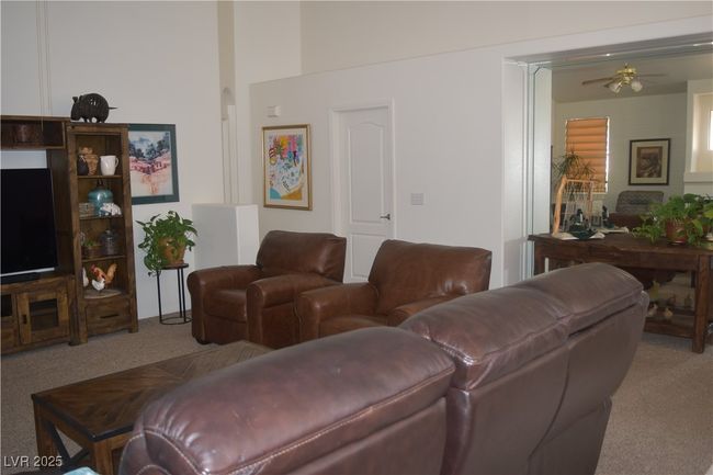 Living room featuring carpet flooring and a ceiling fan | Image 18