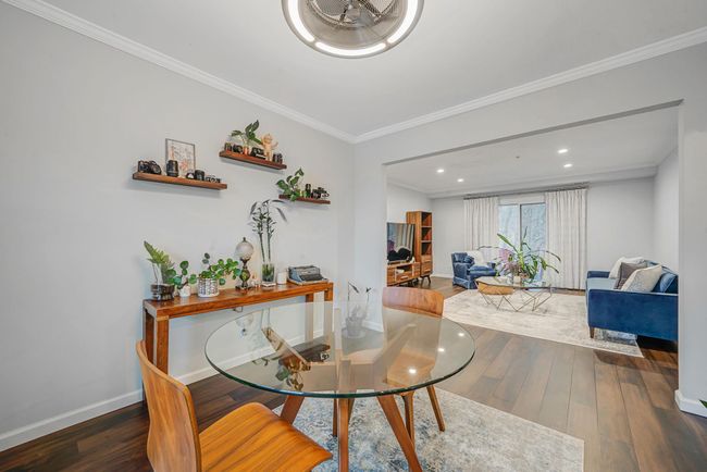 Dining room featuring baseboards, crown molding, wood finished floors, and recessed lighting | Image 18