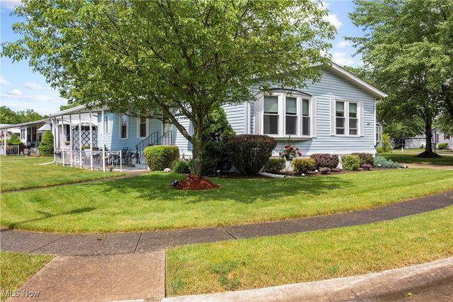 View of front of house featuring a front lawn | Image 5