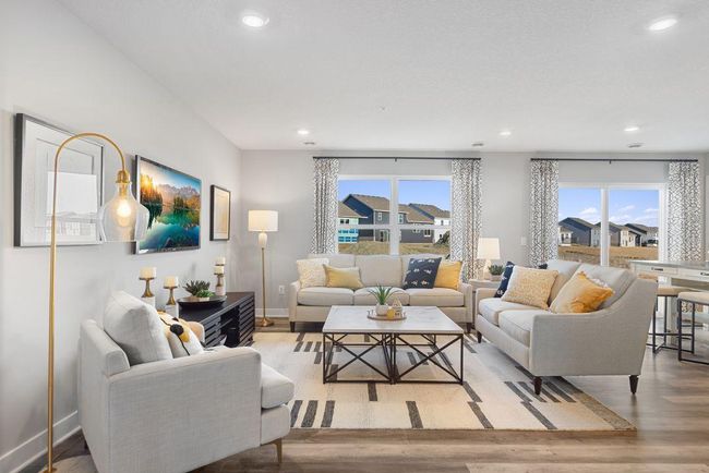 Spacious living room of this open concept main floor! Photo is of model home. Colors and options may vary. Ask Sales Agent for details. | Image 13