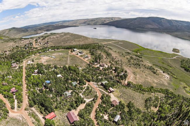 Aerial view of property's location with a large body of water | Image 35