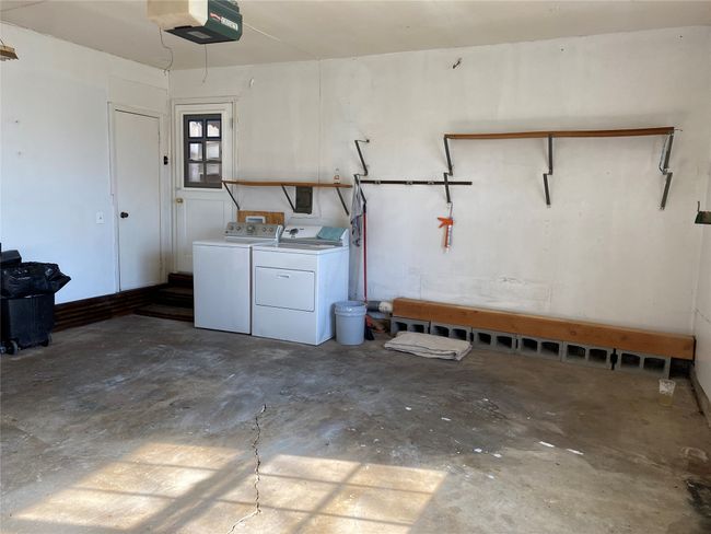 Laundry is in garage | Image 17