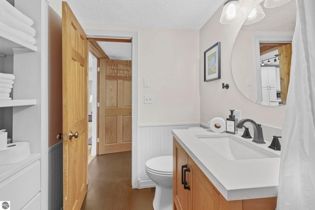 6836 Aarwood Trl Nw, House other with 4 bedrooms, 2 bathrooms and null parking in Rapid City MI | Image 15