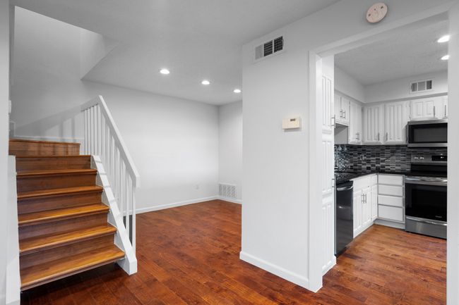Kitchen with countertops, and stainless steel appliances | Image 9