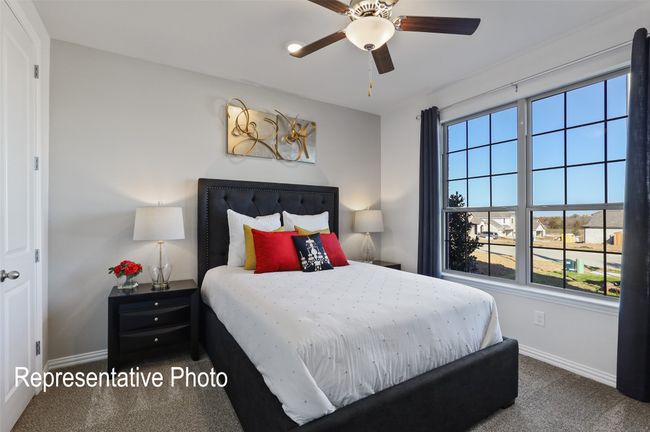 Carpeted bedroom featuring baseboards and ceiling fan | Image 17