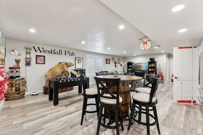 Dining room with recessed lighting, baseboards, and light wood-type flooring | Image 32