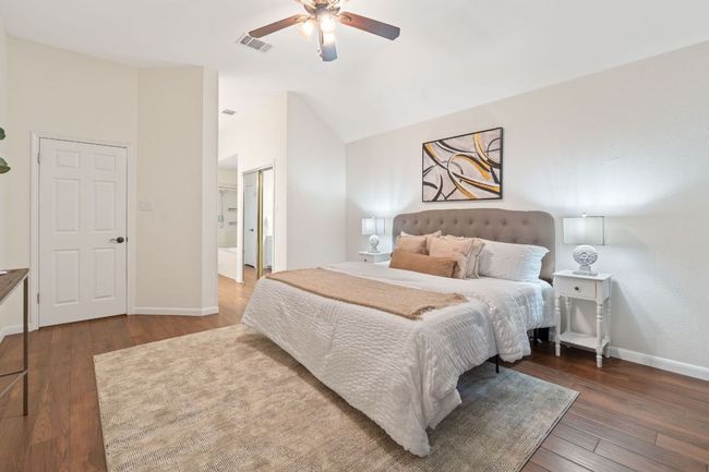 The primary suite offers plenty of space for a king sized bed, furniture, a seating area, and more! | Image 20