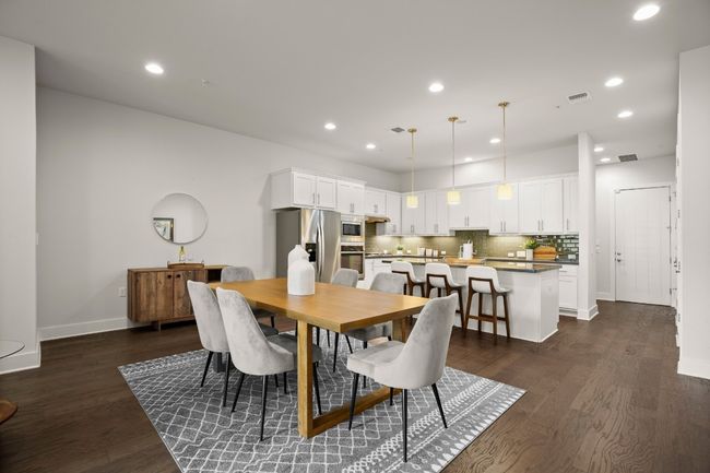 Dining space featuring baseboards, recessed lighting, and dark wood-style flooring | Image 7