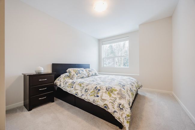 Laundry area with washing machine and clothes dryer, baseboards, and laundry area | Image 24