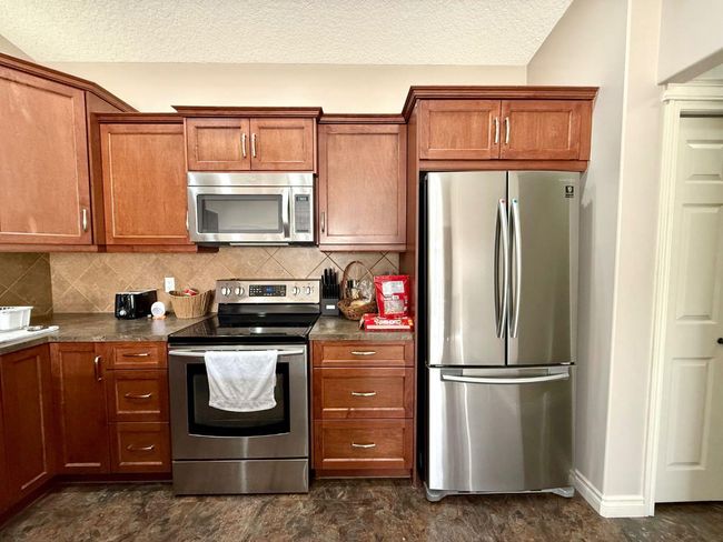 304 Sunvale Cres Ne, Townhouse with 2 bedrooms, 1 bathrooms and 2 parking in High River AB | Image 13