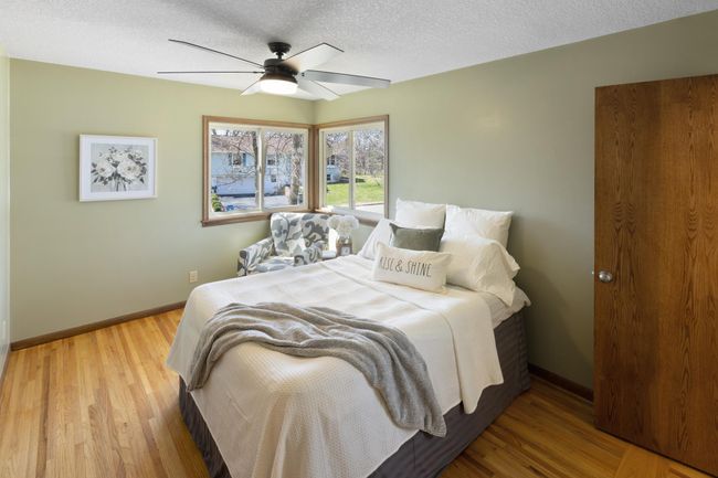 Enjoy this owner's suite with a private 3/4 bath and walk-in closet, both added in 2015. | Image 13