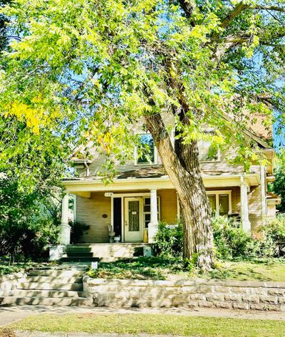 View of front of home with covered porch | Image 2