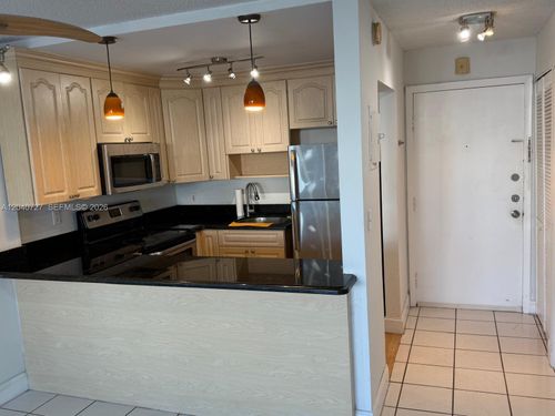 303-1990 Marseille Dr, Miami Beach, FL, 33141-3490 | Card Image