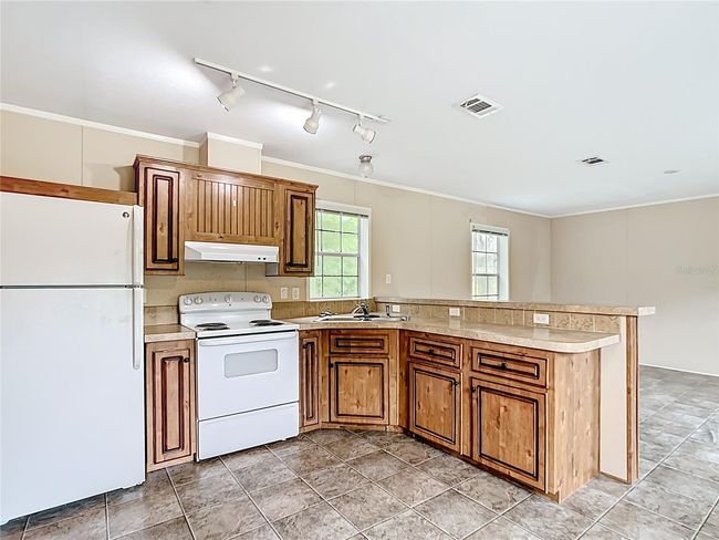 15965 Nw 44 Th Avenue Rd, House other with 2 bedrooms, 2 bathrooms and null parking in Reddick FL | Image 5
