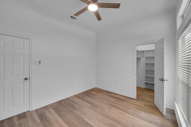 3 extra Bedrooms with light wood-style flooring and a spacious closets | Image 26