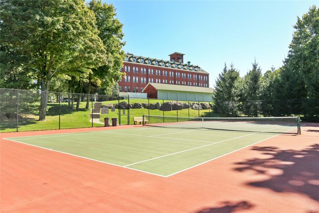 View of tennis court with community basketball court | Image 47