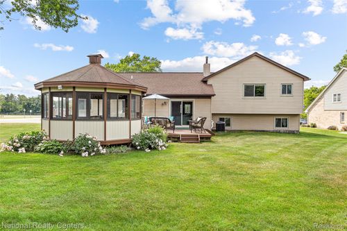 1306 Bishops Ter, Wixom, MI, 48393-1600 | Card Image