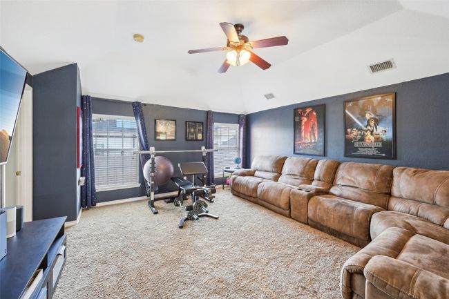 Upstairs game room is flanked by the secondary bedrooms and offers such large, flexible space. | Image 25