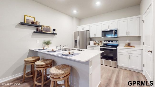 7717 N 170 Th St, Townhouse with 4 bedrooms, 3 bathrooms and 2 parking in Bennington NE | Image 6
