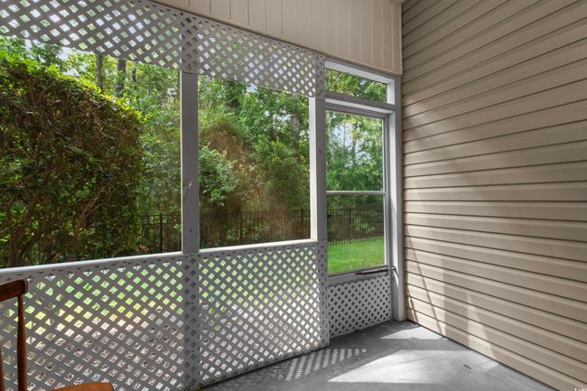 View of unfurnished sunroom | Image 32