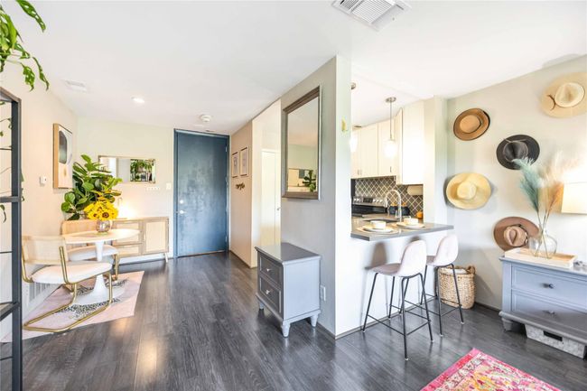 The living space is both inviting and functional. | Image 5