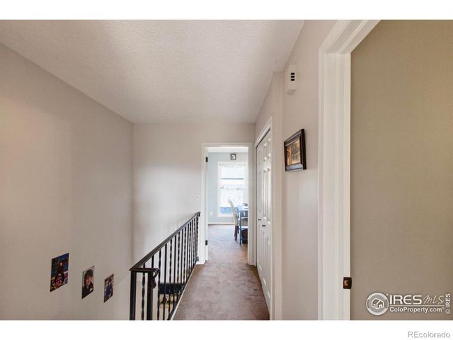 The laundry closet is conveniently located on the upper level close to the bedrooms and full bath. | Image 18