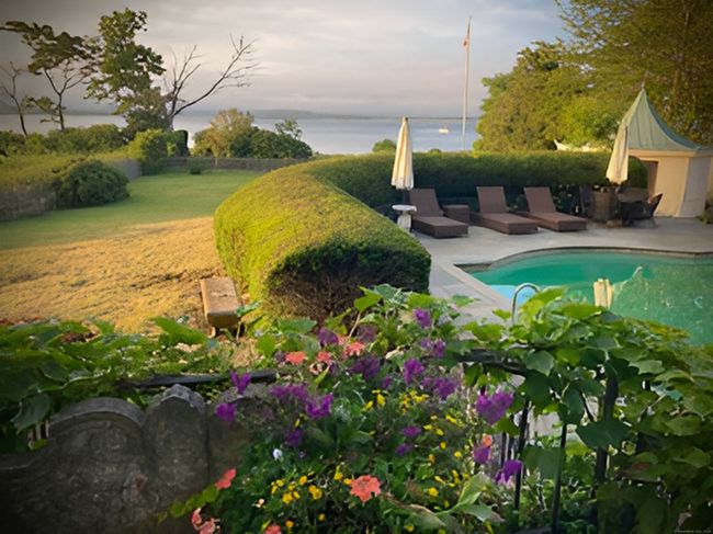 A Magical Sunset...Encompassed Within This Enchanting Setting Lies A Picturesque In-Ground Pool Surrounded By Mature Plantings, Vibrant Hydrangeas And Colorful Perennials | Image 37
