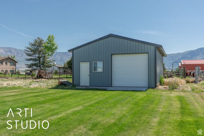 Detached garage with a mountain view | Image 43