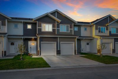 123 - 137 Red Embers Link Ne, Townhouse with 3 bedrooms, 2 bathrooms and 2 parking in Calgary AB | Image 1