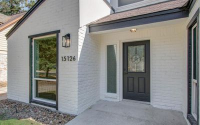 large dining room window provides lots of natrual light and neighborhood scenery | Image 3