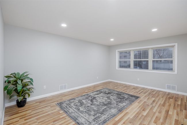 Empty room featuring light hardwood / wood-style floors | Image 10