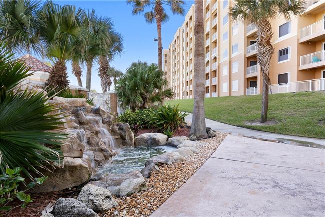 Walkway to the Waterfall Cabana Heated Pool | Image 61