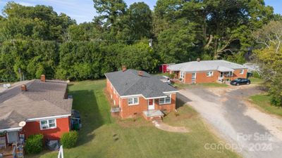 1313 Commercial Avenue, Home with 4 bedrooms, 2 bathrooms and null parking in Charlotte NC | Image 2