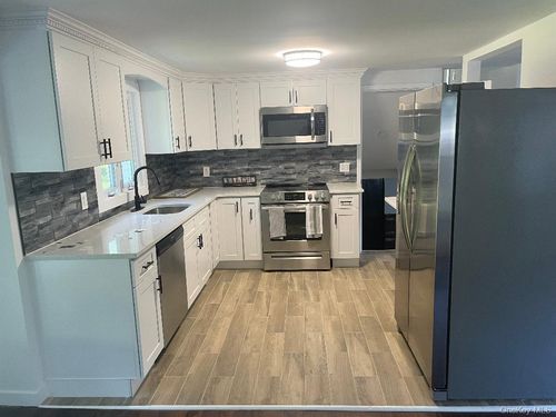 12 Croton St, Melville, NY, 11747-1415 | Card Image