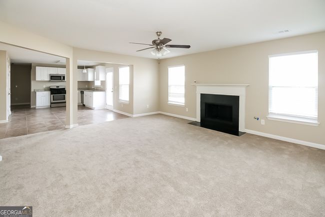 7144 Caspian Dr, House other with 7 bedrooms, 3 bathrooms and null parking in Fairburn GA | Image 4