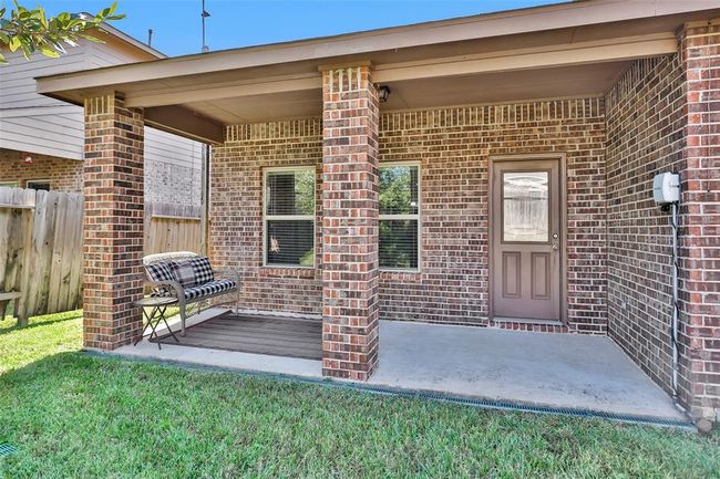 8458 Coral Cove Pass Ln, House other with 3 bedrooms, 2 bathrooms and 2 parking in Conroe TX | Image 4