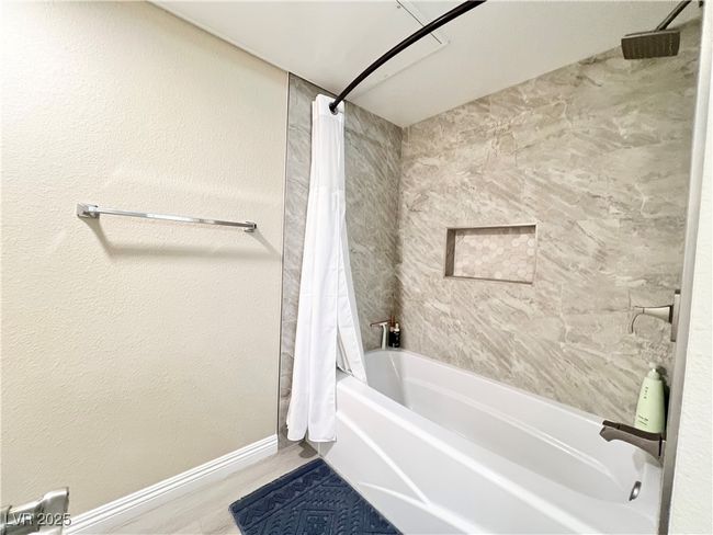 Separate water closet with new tub and tile surrounds | Image 6
