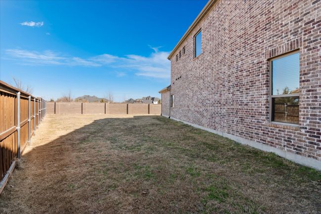 View of yard featuring a fenced backyard | Image 23